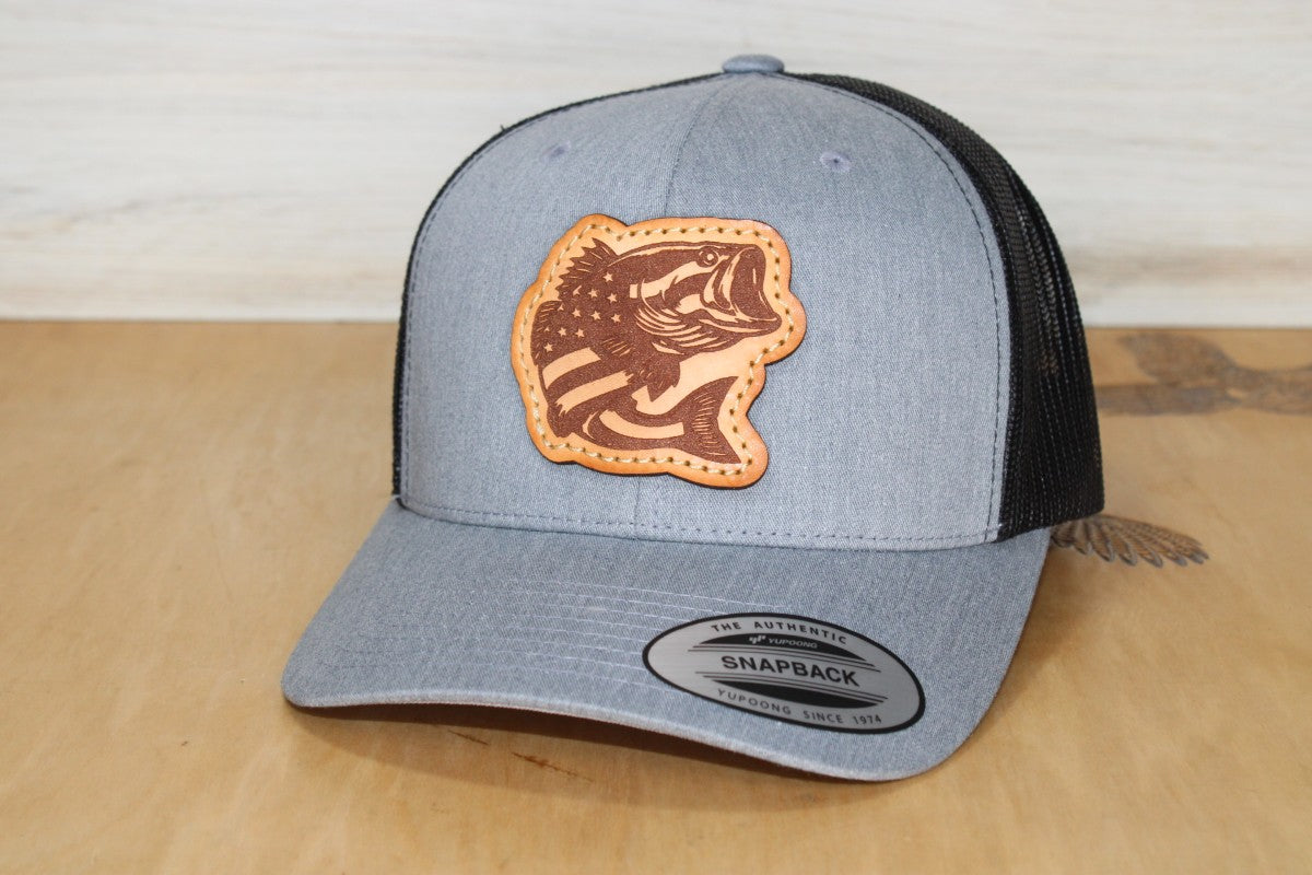Gray and black trucker cap with fishing leather patch