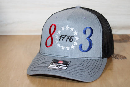 Gray cap with 803 red, white, and blue design 