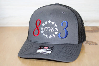 Charcoal and Black cap with 803 red, white, and blue design 
