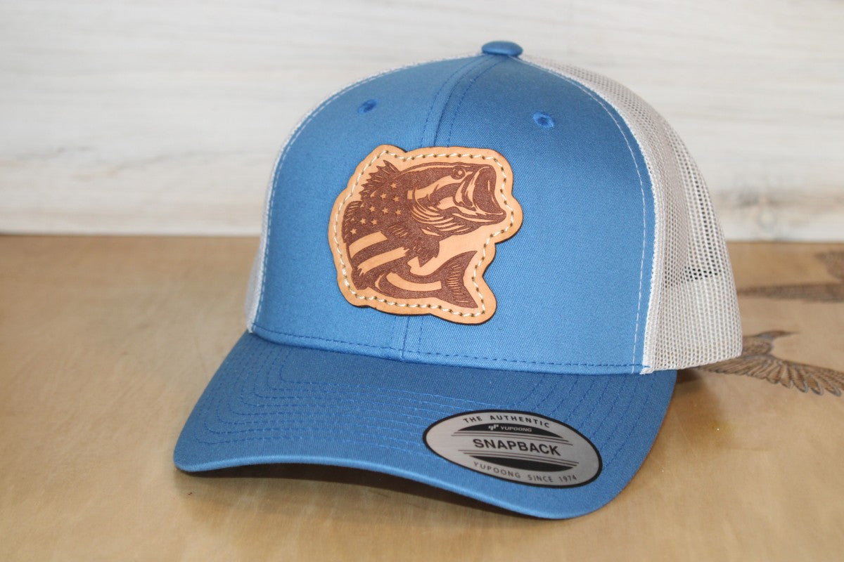 Blue and white cap with a fishing leather patch