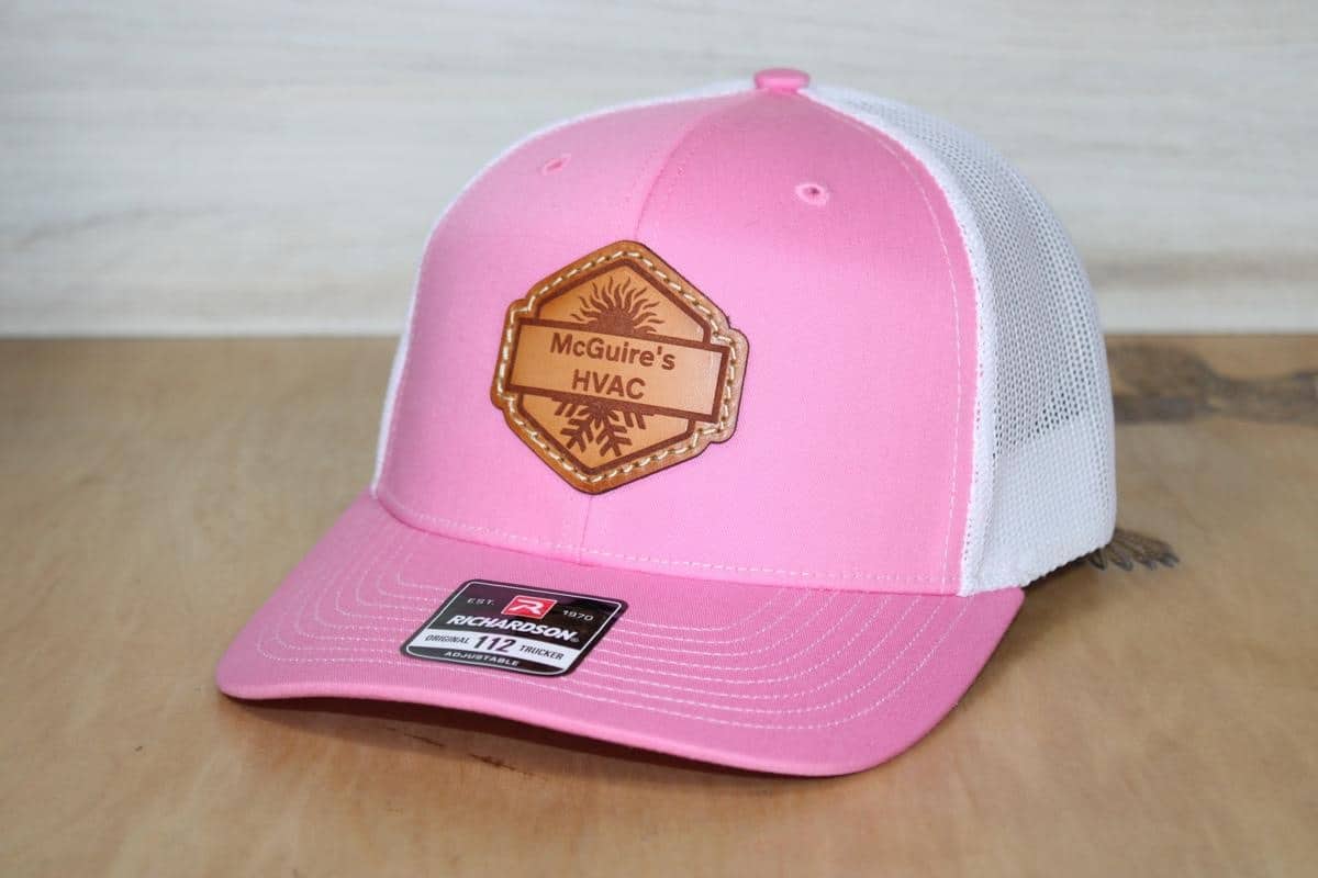 pink company logo leather patch hat